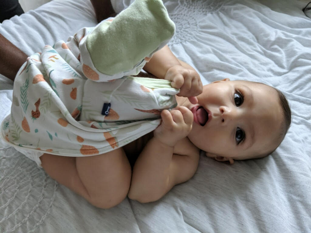 Ayla wearing her mama's favorite outfit from her UpChoose Baby Set.