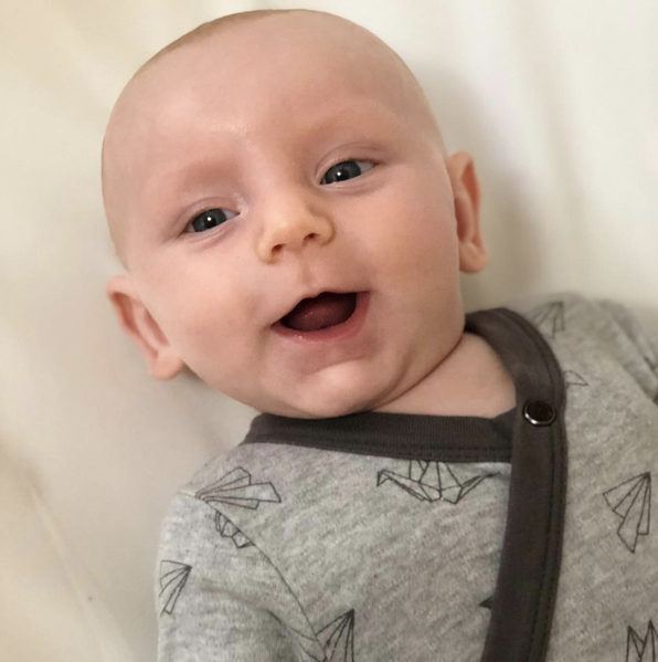 Jonathan wearing a Finn and Emma bodysuit from his UpChoose Baby Set