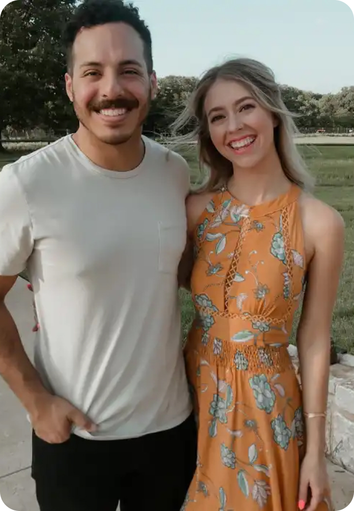 Smiling couple embracing each other, radiating happiness